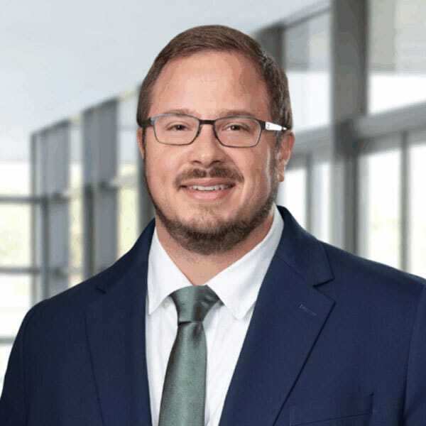 Eric Buechele, 80/20 Leader, headshot promoting leadership strategies and sustainable growth.
